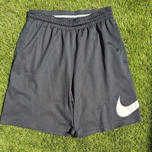Men’s Nike Black Athletic Shorts with White Swoosh features drawstring & pockets